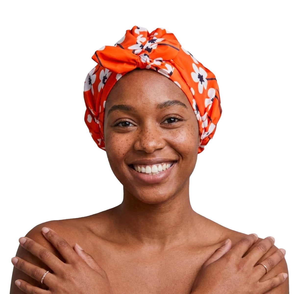 Model wearing Clementine shower cap against a clean white background