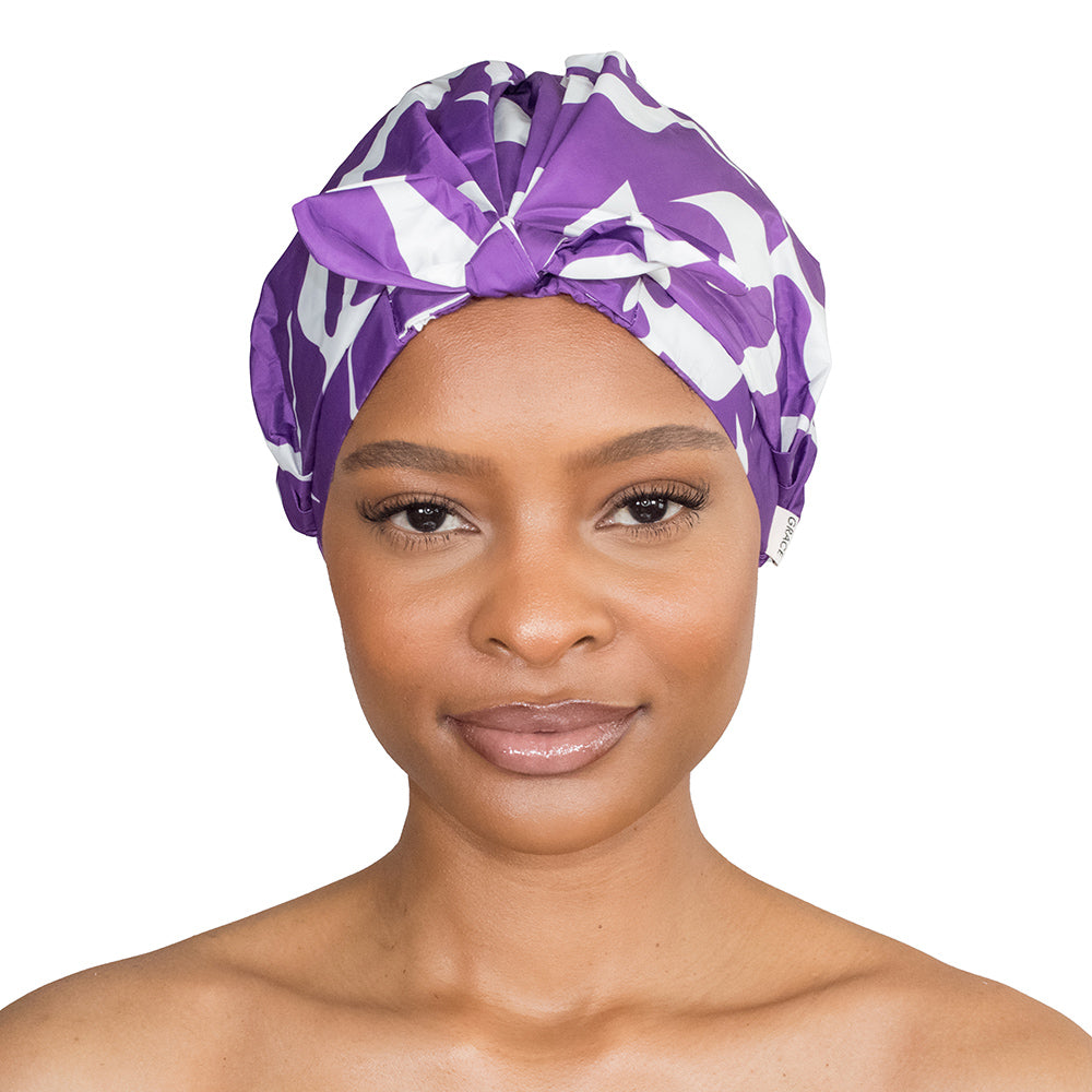 Model wearing Esther shower cap on a clean white background